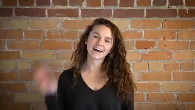 BlackSquare team members, one at a time against a brick wall, waving and smiling at the camera, ending on the BlackSquare logo