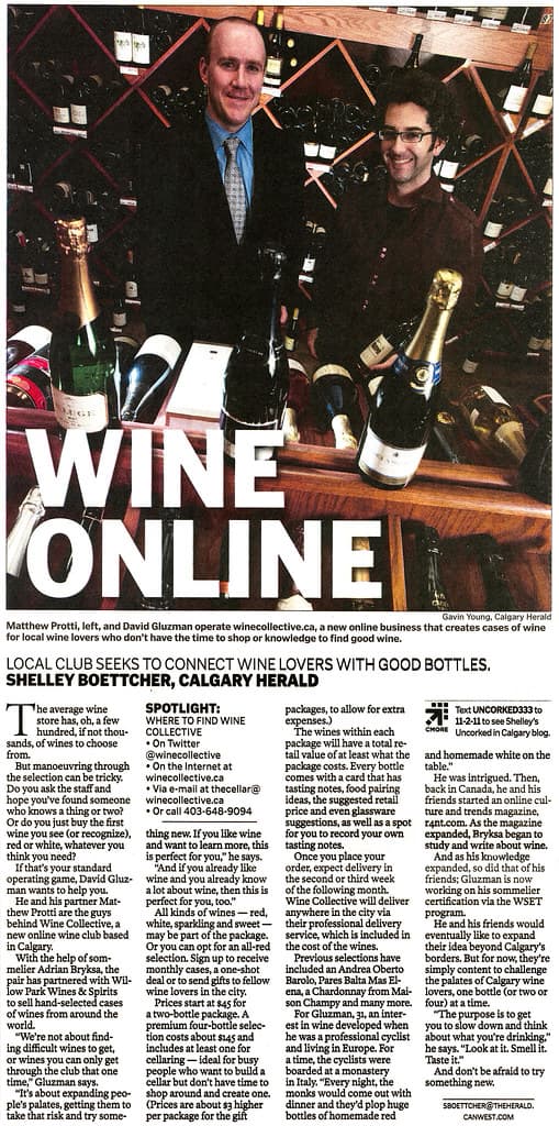 Calgary Herald photo of David Gluzman and his WineCollective partner among wine bottles
