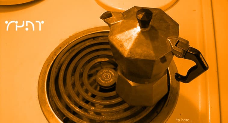 The first R4NT cover, March 2001, showing a Bialetti moka pot on an electric stove coil in sepia orange, with the R4NT wordmark and the text 'It's here...'